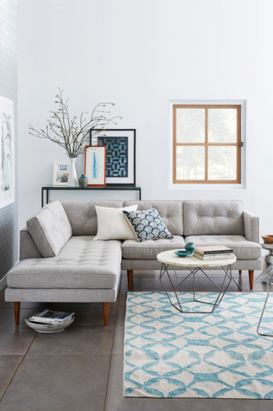 Ways to Welcome a Grey Sofa Into Your Living Room